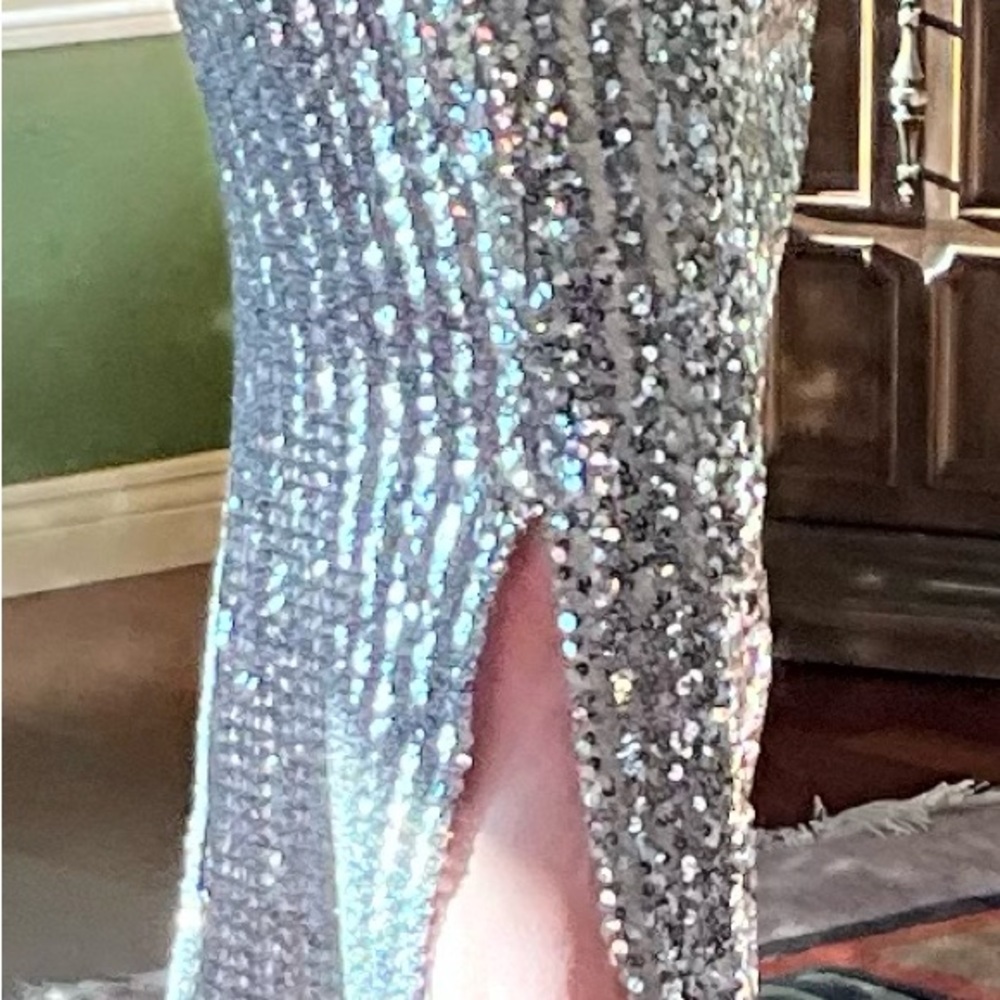 Silver Sequined Fabric Hand Crafted into a Pull On Style Skirt with Side Slit